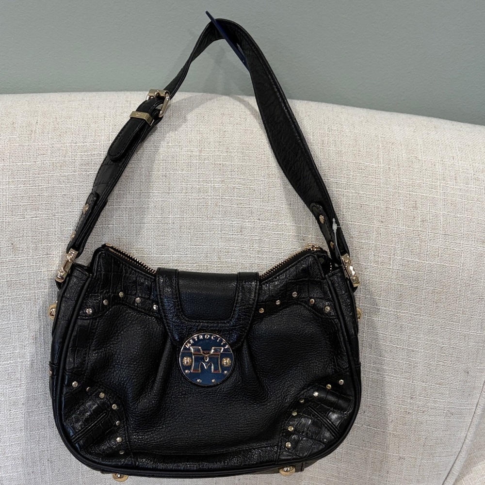 Stylish Black Shoulder Bag with Gold Accents